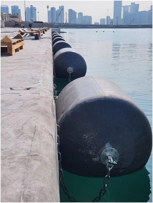 How does foam-filled fenders enhance the operational efficiency of wharves?